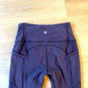 Lululemon 28” leggings with side pockets, size 4